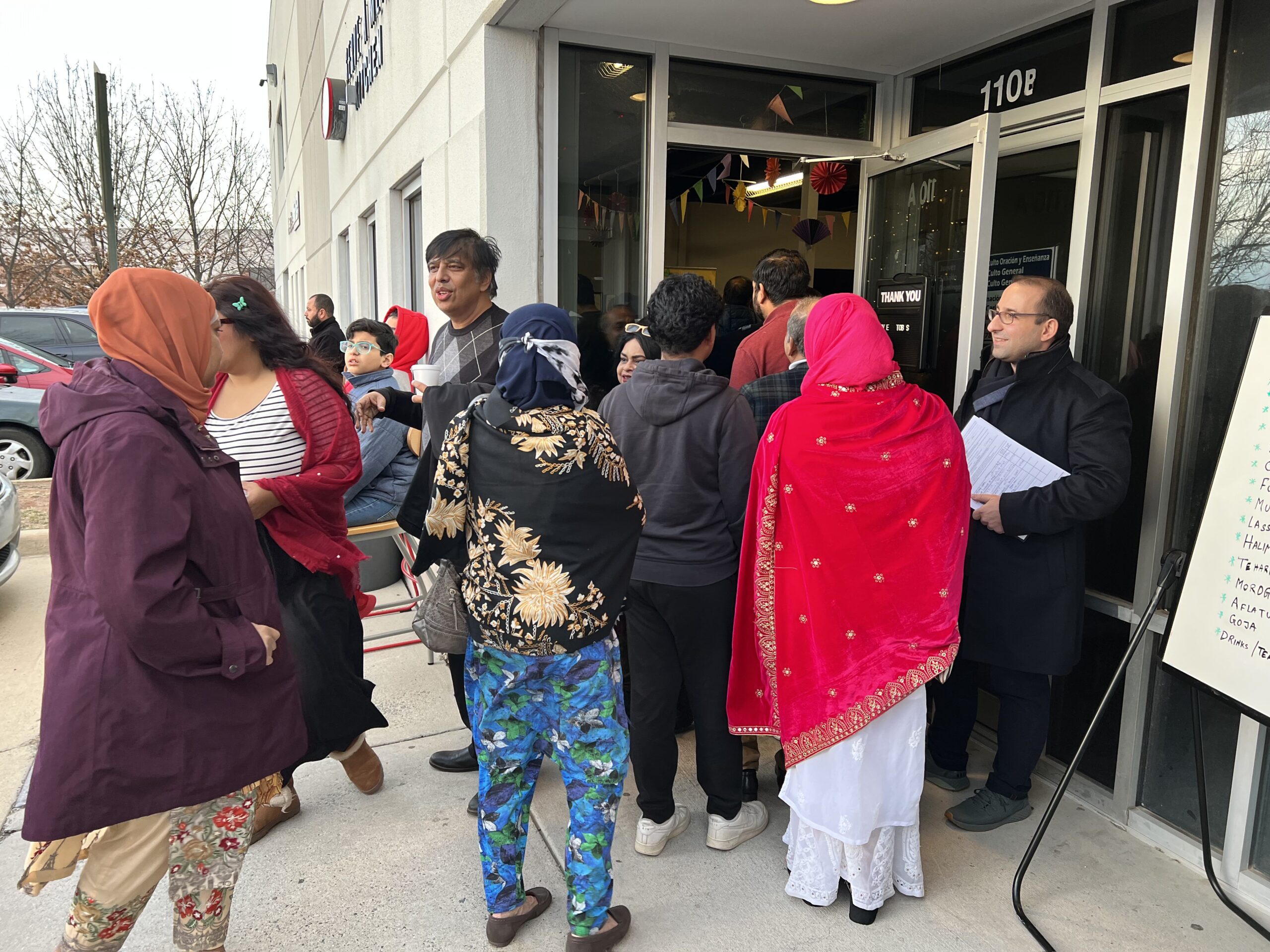 Arben Istrefi at a community event with constituents from the Bangladeshi community. 